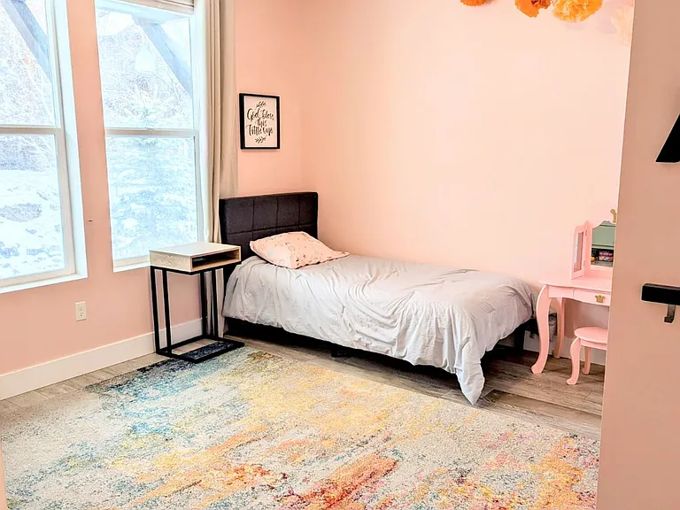 Currently a very pink bedroom, perfect for a little girl but can be painted neutral upon request.