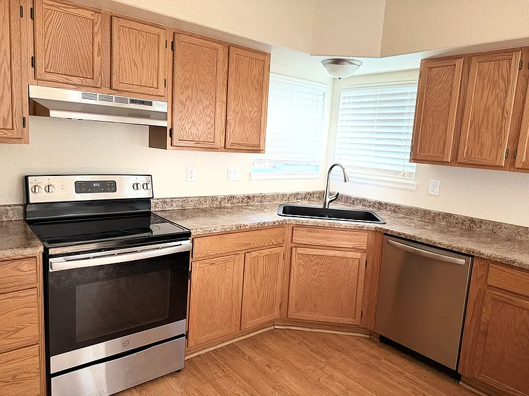 Open Kitchen: Stainless Steel Appliances