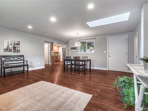 Door off dining area takes you to huge covered deck. 