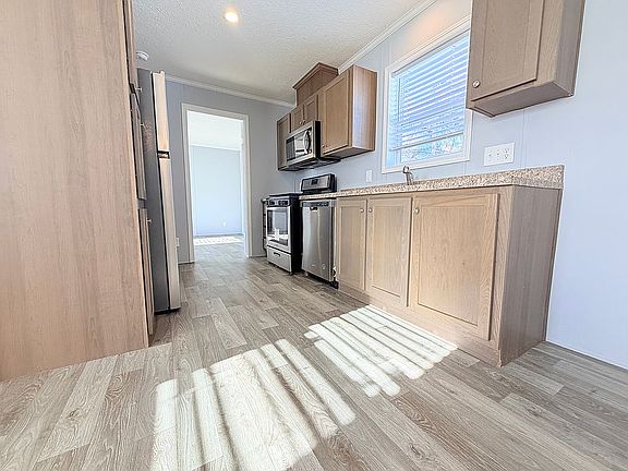 3rd image of 534 E 37th Ave Lot 106