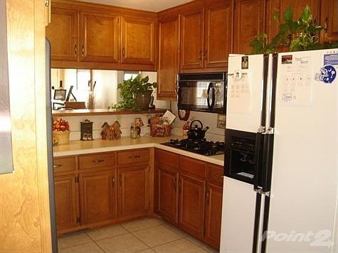 Kitchen with chair/bar area