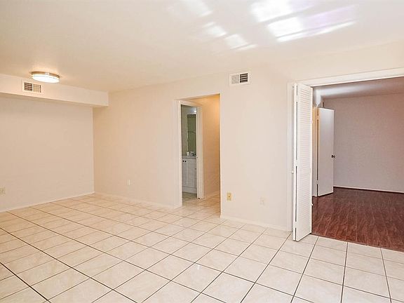 5th image of 10555 Turtlewood Ct Unit 702