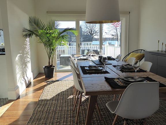 Dining room with sliders to the deck