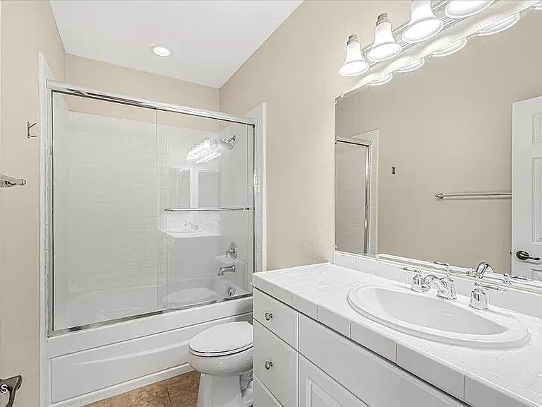 Larger Bedroom connected Bathroom