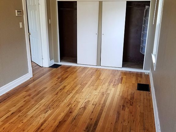 Other side of largest bedroom to show closets and addition overhead storage