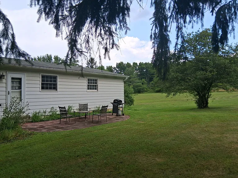 Private patio and garden area with views of property's ample green space