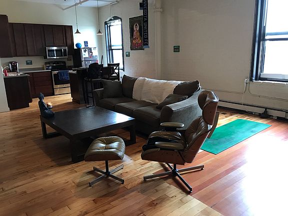 Hardwood Floors, Brick Walls, New Lighting and Ceiling Fans