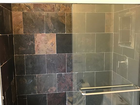 Custom walk in slate shower