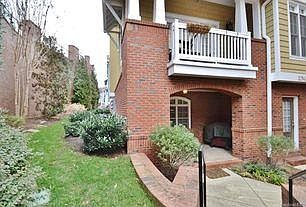 Patio with balcony off the living room