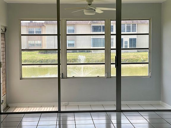 Water & fountain behind lanai with door to outside: your 'backyard'. 
Does NOT face a street or parking lot.
