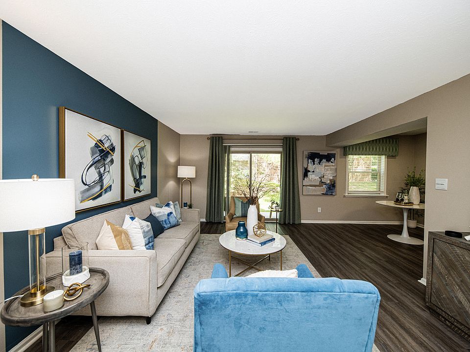 Spacious Living Room with Hardwood Style Flooring