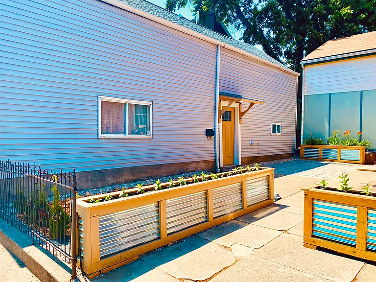 Front yard with raised garden beds