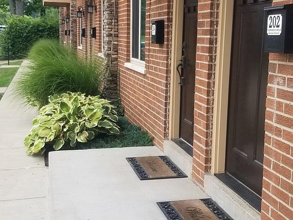 Spring time photo of 6-unit building