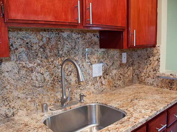 Granite Countertops, Stained Cabinetry, Granite Countertops