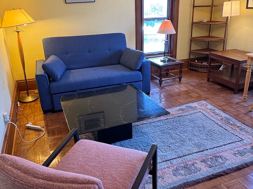 Living room with brand new sofabed & armchair from Rubin's.