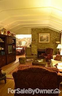 Kitchen/Breakfast Room
						:
						Open/airy Kitchen. Breakfast area with beautiful view of back yard and woods.