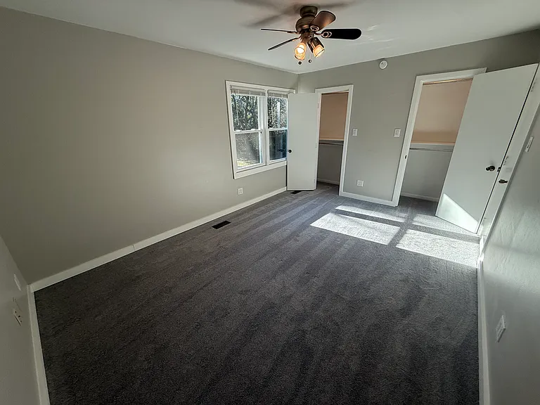Back bedroom view to two (2) closets and large backyard
Plenty of outlets