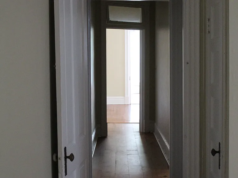 hallway connecting rooms to living space