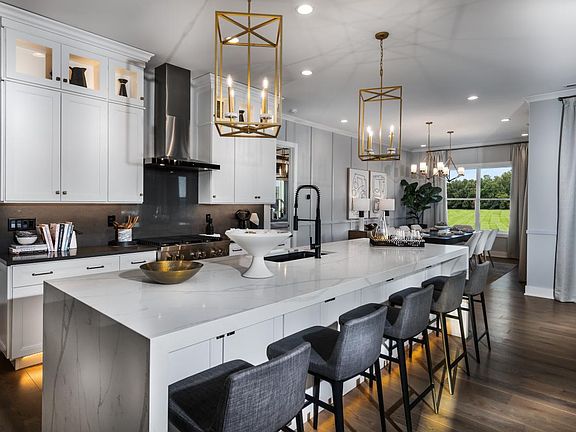Well-appointed kitchen with center island and ample counter space