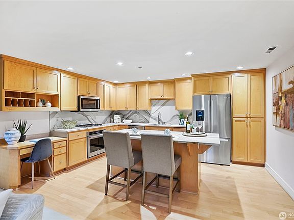 Kitchen was updated in 2022 with quartz counters and stainless-steel appliances