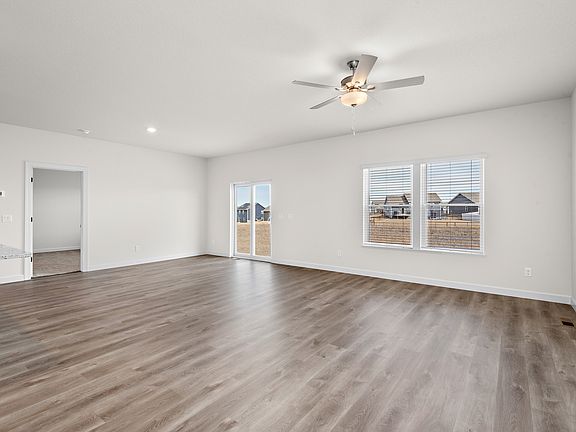 The kitchen is open to the family room and dining area.