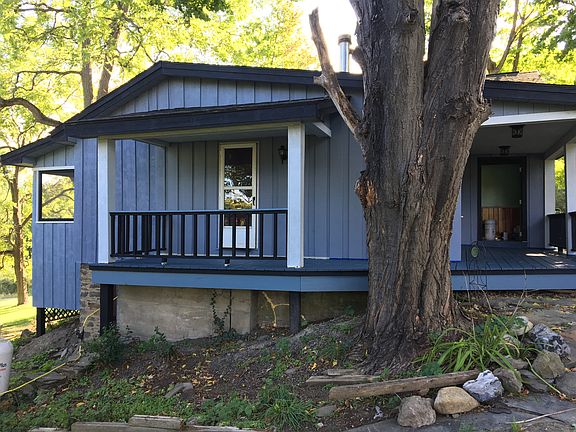 Back w/wrap around porch