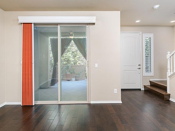 Den with sliding doors to patio