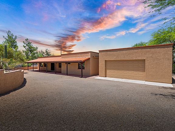 Walled and gated house with 2-car garage