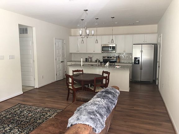 Open floor plan: kitchen, dining and living room