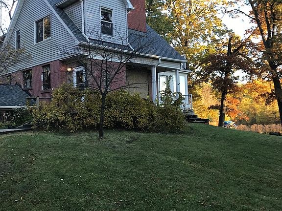 Enjoy peaceful country setting on large open lot with beautiful views of canal and Indian Lake.