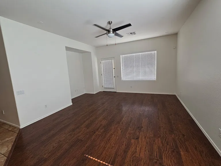 Living room with door to the backyard