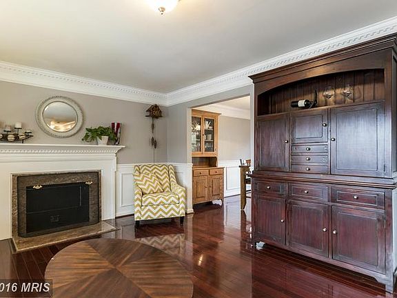 Living Room features granite hearth fireplace