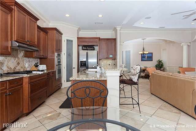 The kitchen is fully stocked with appliances!