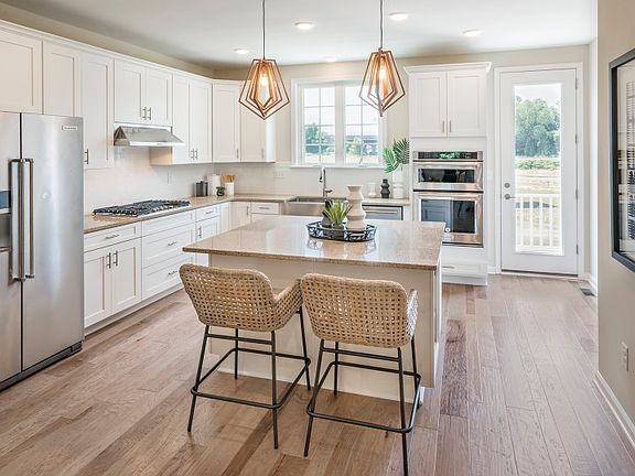 Large center island and chef-inspired storage