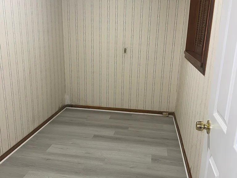 bonus room . can be used for storage or extra closet space