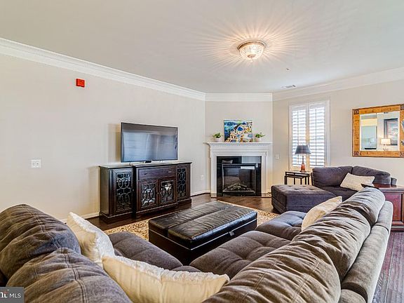 Spacious family room with eletric fireplace.