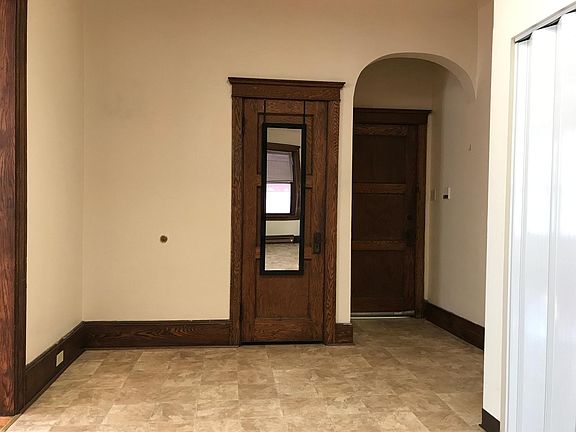 Kitchen looking toward entrance. Kitchen has a closet/pantry.
