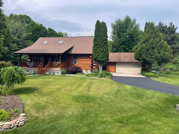 11999 Cabin Ln, Rapid City, MI 49676