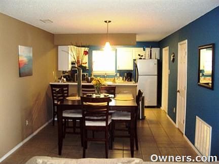 Living Room View of Dining Area and Kitchen
