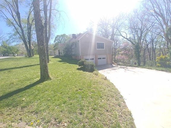 side with 2 Garages