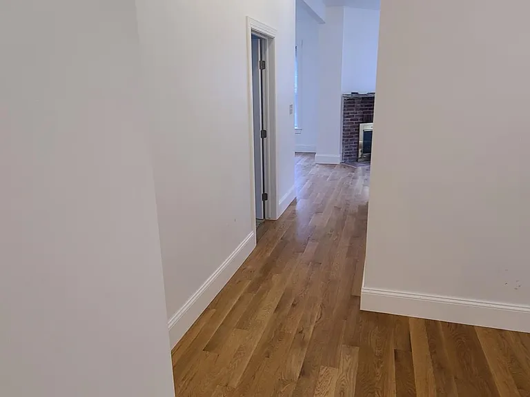 Hall from kitchen / dining room to living room / family room