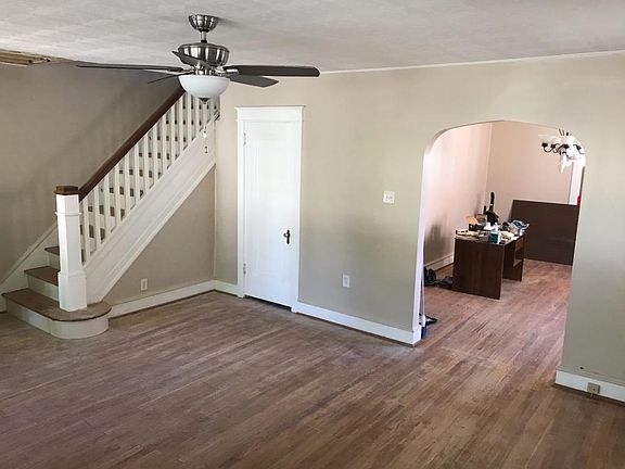 Limited bedroom photos due to floor refinishing and painting in progress
