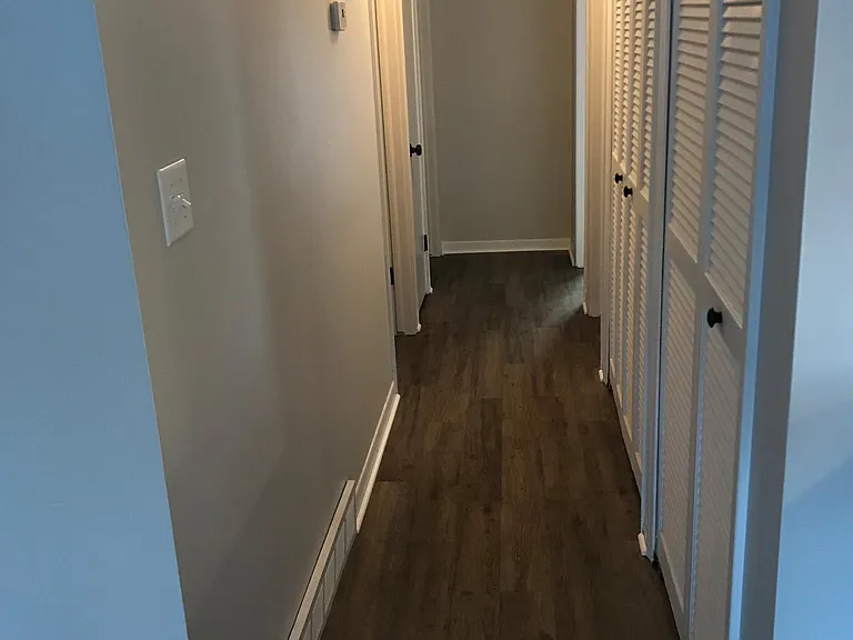 Hallway to the bathroom, 3 bedrooms, including the master bedroom, and front hall closet.