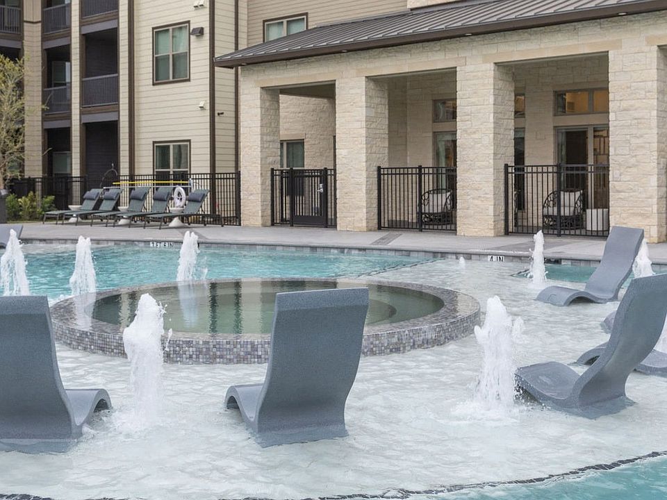 Resort-Style Pool with Grilling Area, Tanning Ledges, Cabanas & Hot Tub at The Bridge at McKinney