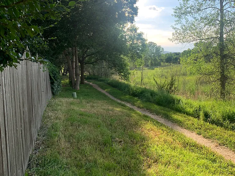 home backs up to open space green belt and bike path