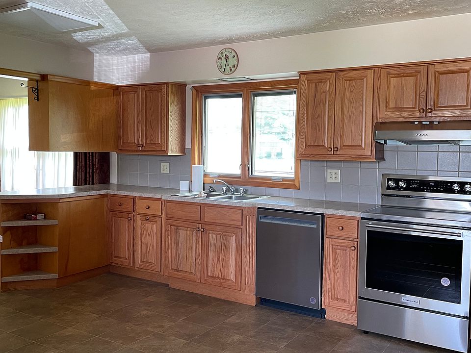 New stove and dishwasher in this large kitchen
