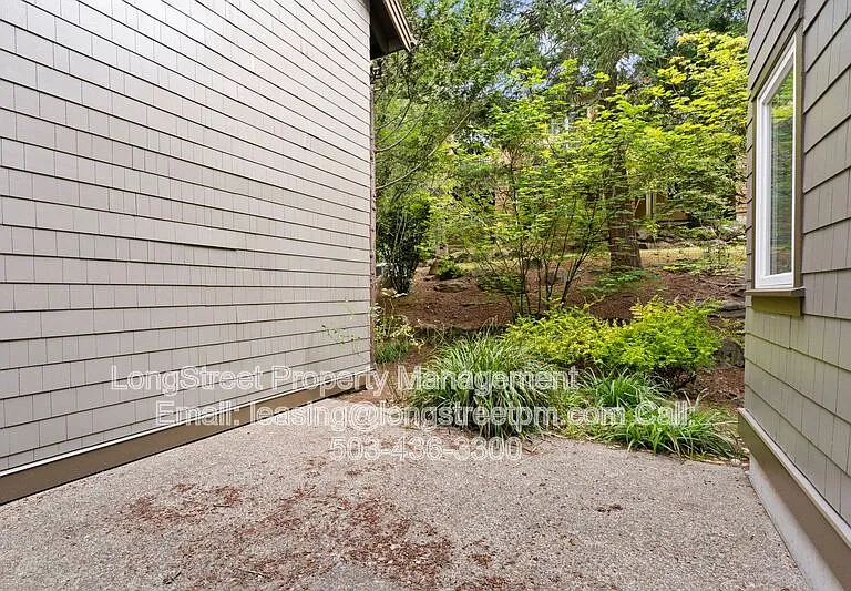10247 NW Village Heights Dr — Photo 49