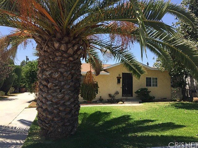 THIS IS THE LISTED DUPLEX FRONT HOUSE (7138 LUXOR STREET)