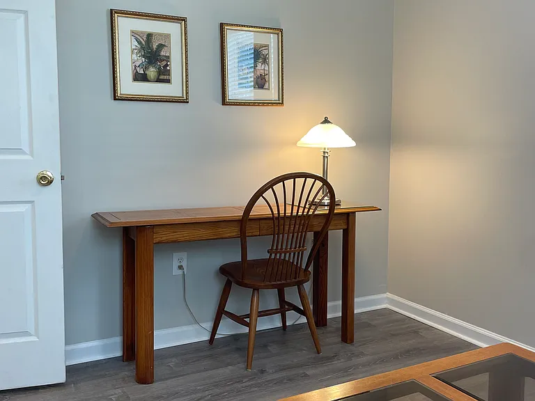 Separate study with privacy door with work table and full size sleeper loveseat