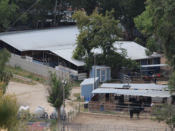 Center Aisle Barns & corrals